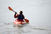 kayaking in the sea in winter, Dell Quay, Chichester, West Sussex, England,